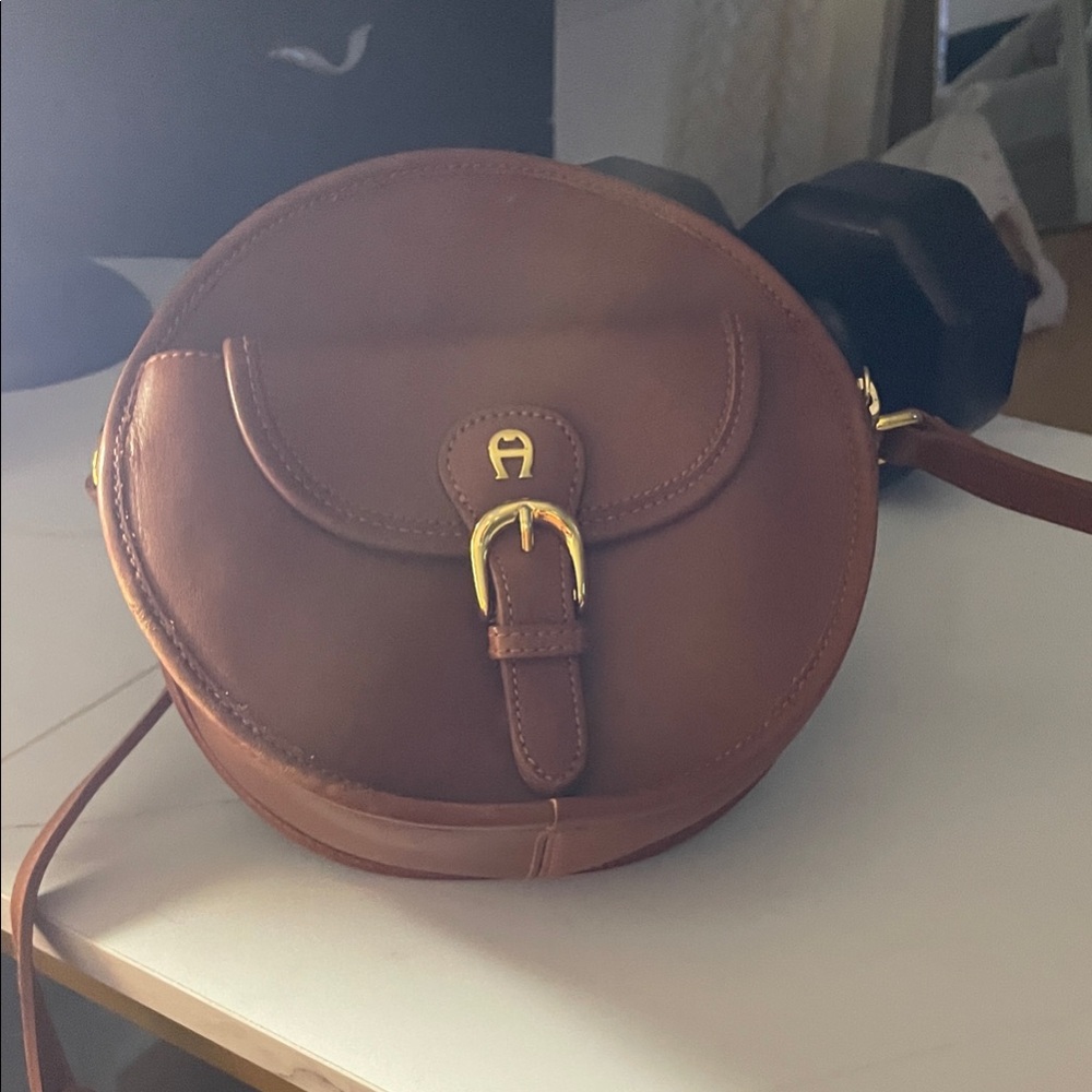 Etienne Aigner Round Brown Crossbody Bag with Gold Buckle